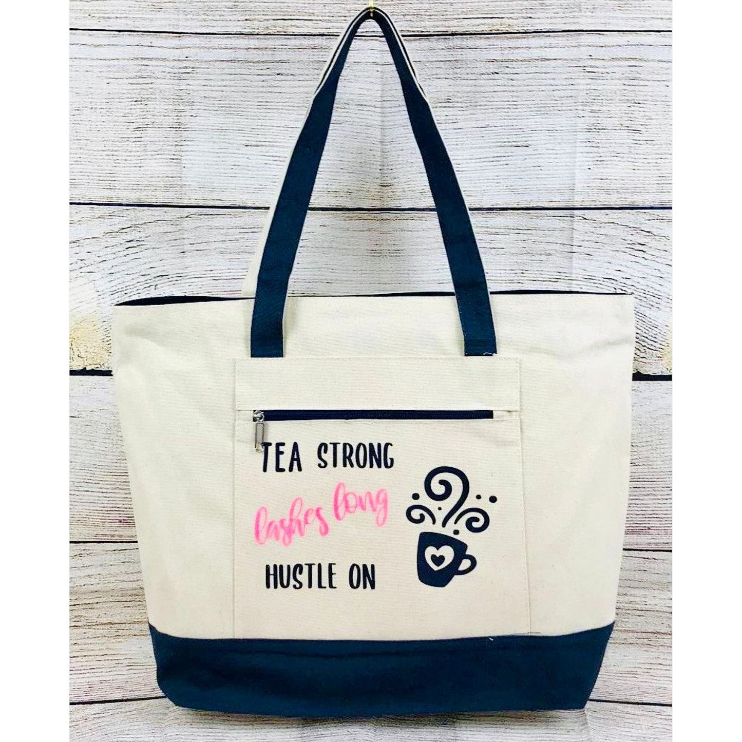 Canvas Tote with Front Zip Pocket "Tea Strong Lashes Long Hustle On"